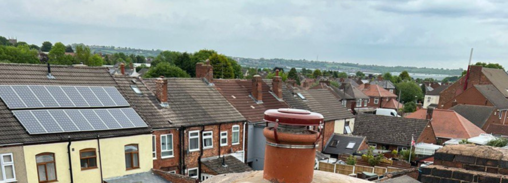 This is a photo taken from a roof which is being repaired by Hucknall Roofing Repairs, it shows a street of houses, and their roofs